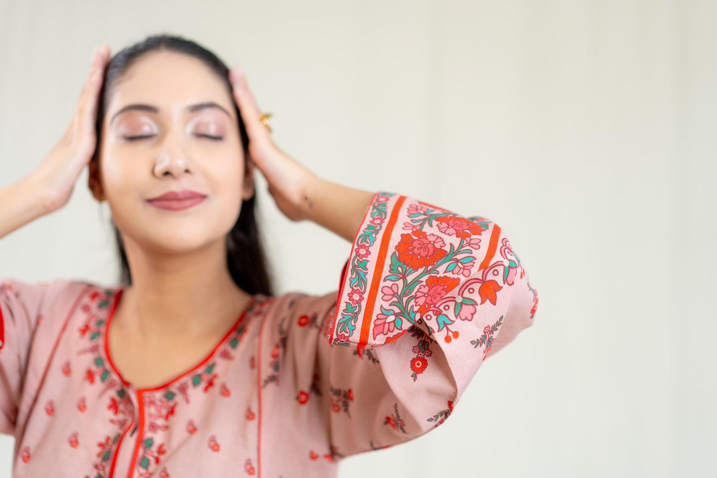 Red Base Adorned With Vibrant Floral Prints