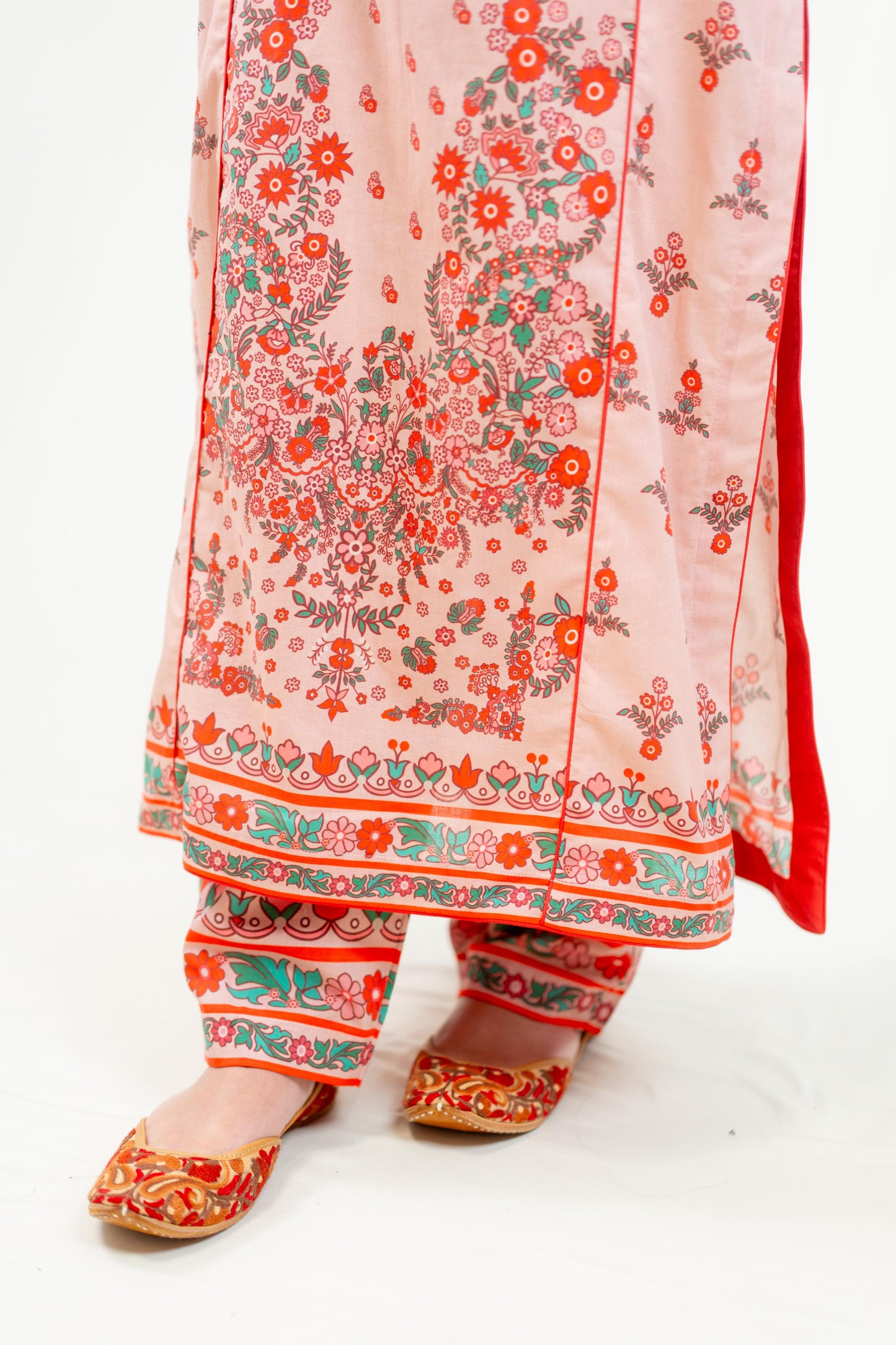 Red Base Adorned With Vibrant Floral Prints
